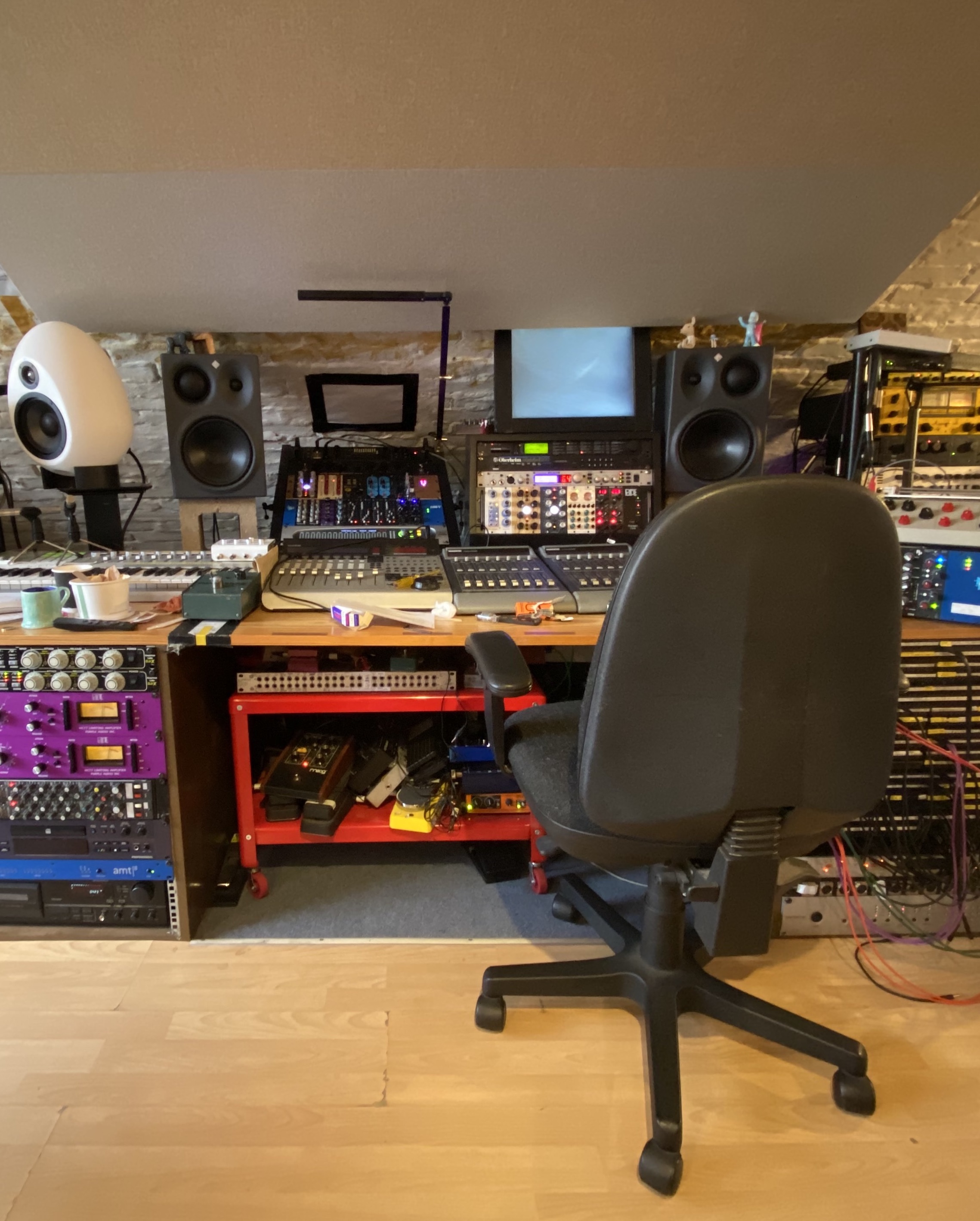 Image of a messy recording studio mixing desk